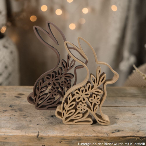 3D-gedruckter Deko-Hase im Singleline-Design in zwei Größen mit floralem Muster auf einem Holztisch in gemütlicher Wohnatmosphäre